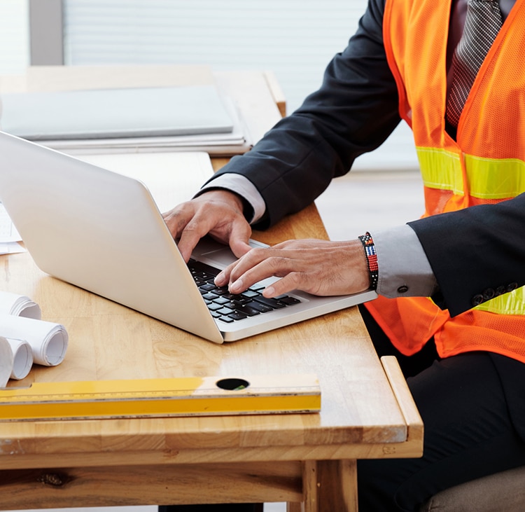 Technician using job management software